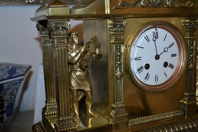 Preview of the first image of 19th Century solid brass mantle clock.