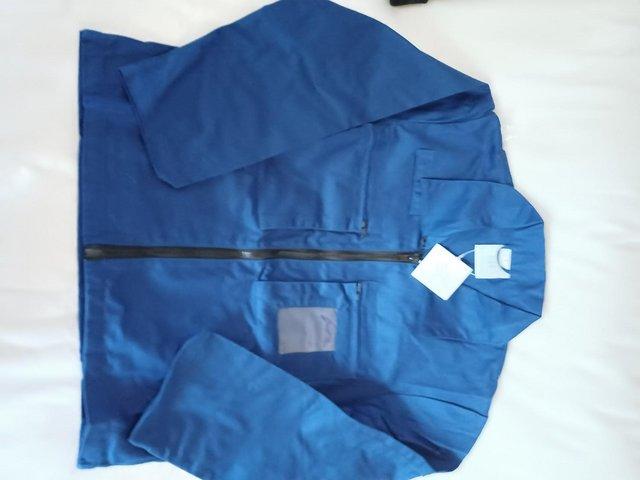 Preview of the first image of Royal blue XXL overall jacket new high quality still in new.