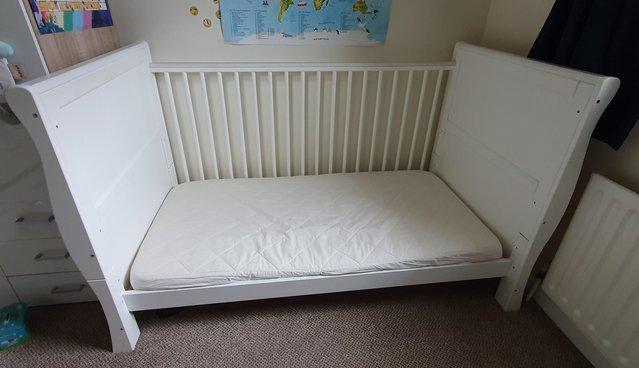 Preview of the first image of Scarlett convertible cot bed with mattress.