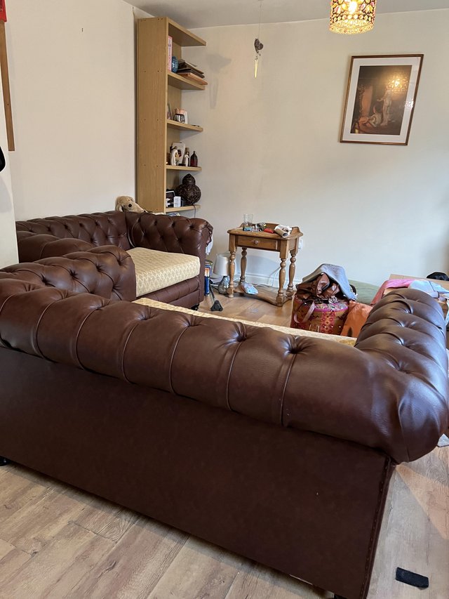 Preview of the first image of 2 Brown 2 Seater Chesterfield Sofa’s..