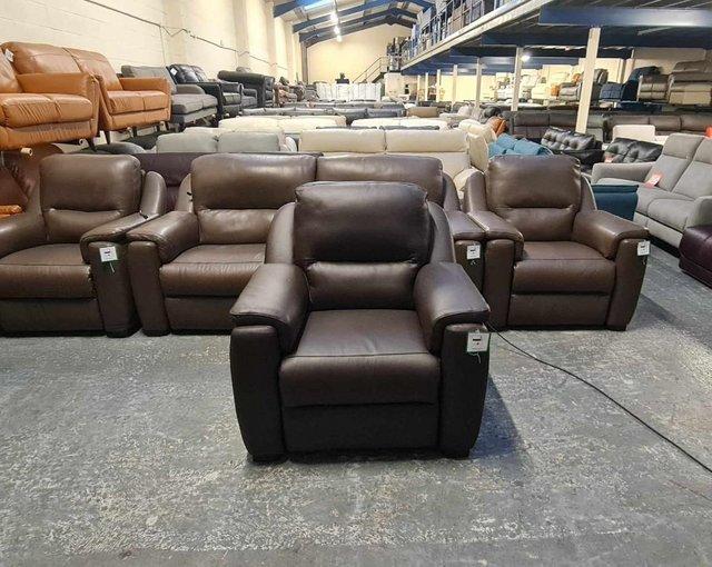 Preview of the first image of Avola dark brown leather electric recliner armchair.