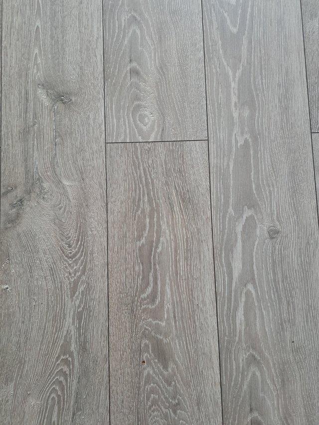 Preview of the first image of Laminate flooring grey very good condition.