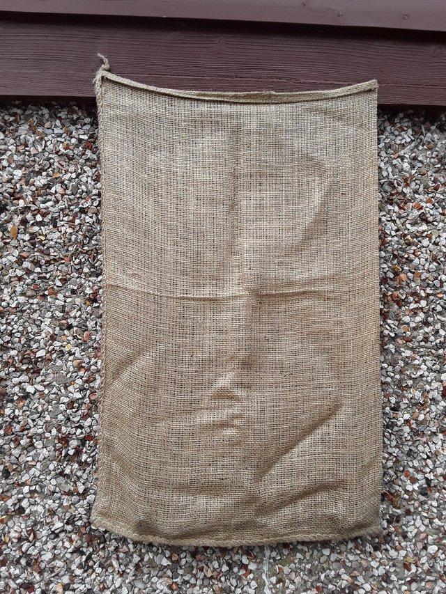 Preview of the first image of Brand new and unused hessian sacks..