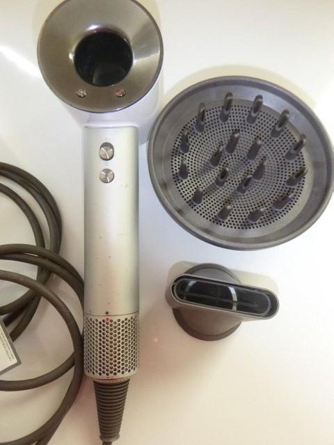 Preview of the first image of DYSON HD01 SUPERSONIC HAIRDRYER AND ACCESSORIES.