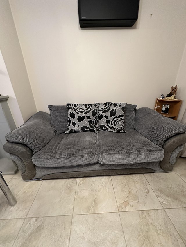 Preview of the first image of Couches for sale. 3&4 seater grey.