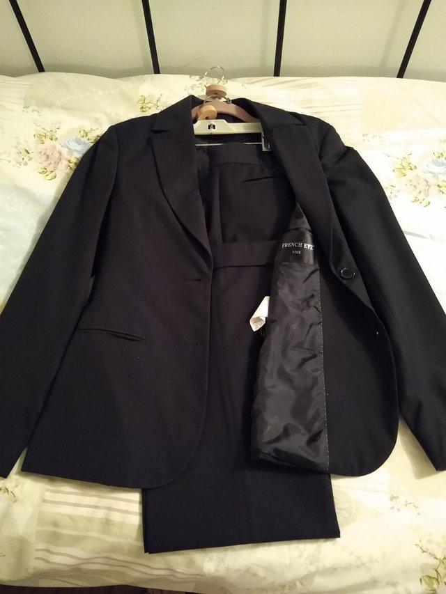 Preview of the first image of French Eye, black suit size 6, trousers and jacket.
