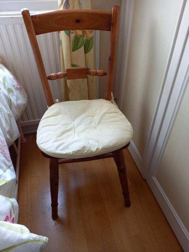 Preview of the first image of Pinewood chair with cushion suitable for bedroom.