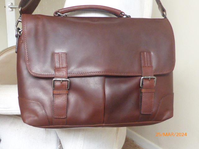 Preview of the first image of Leather Holdall multi pockets Unused.
