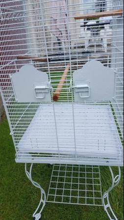Image 13 of Large bird cage with stand , comes with perches , feeders