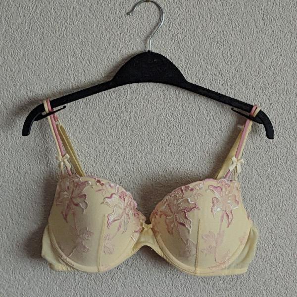 Preview of the first image of Ladies Lemon/Pink Padded Underwired Bra By Next - Size 34D.