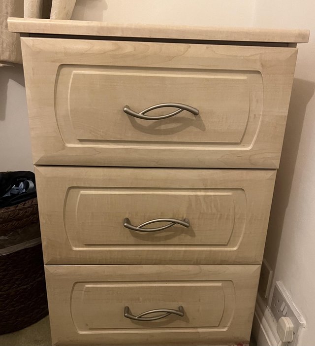 Preview of the first image of A pair of cream chest of drawers (narrow).