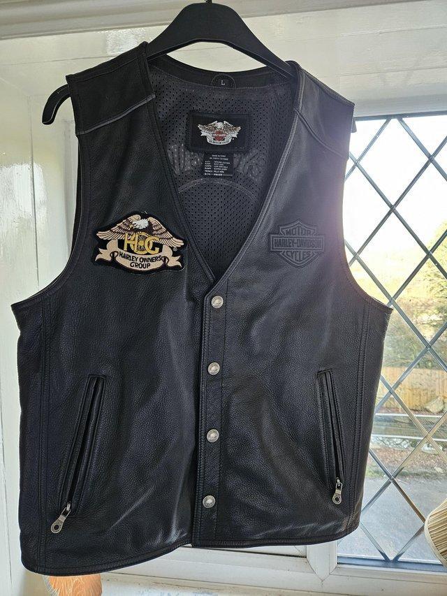 Preview of the first image of Harley Davidson black leather waistcoat.Genuine.Large (mens).