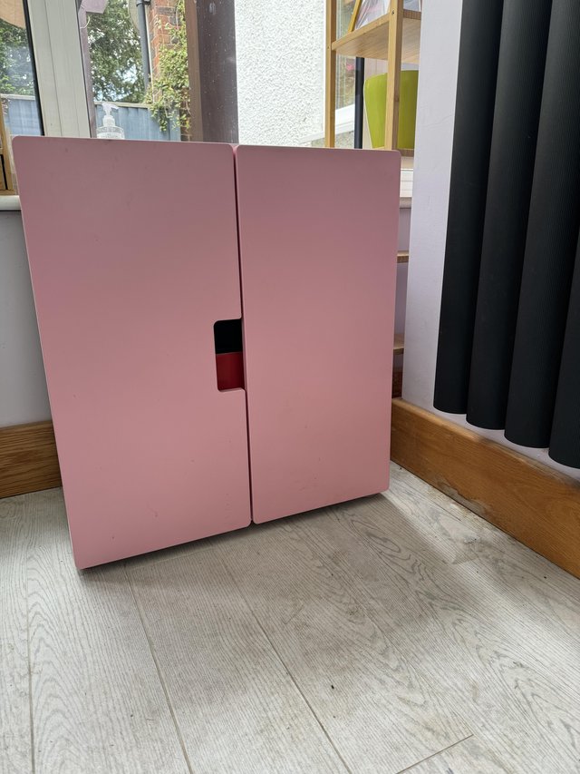 Preview of the first image of IKEA cabinet pink and white.