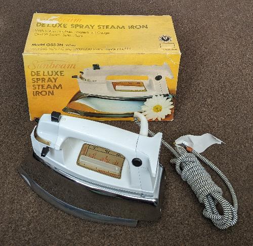Preview of the first image of Vintage Sunbeam Deluxe Spray Steam Iron.