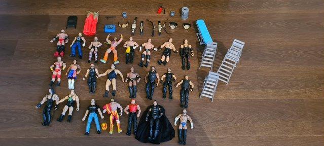 Preview of the first image of Over 50 collectible WWE action figures.