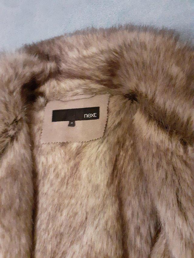 Preview of the first image of Vintagenext fur lined sude jacket.