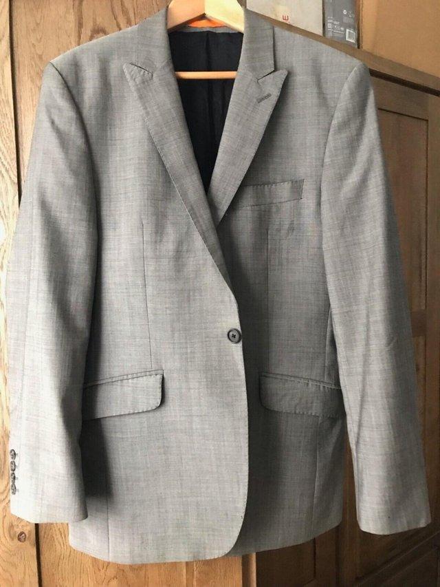 Preview of the first image of Ben Sherman Men's Grey Kings Fit Suit Jacket, size 38R, worn.