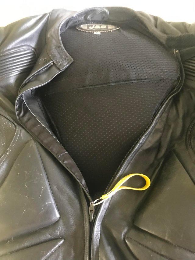 Preview of the first image of J&S motorcycle leathers in black.