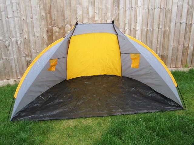 Preview of the first image of Beach shelter/tent in grey and yellow.