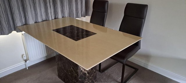 Preview of the first image of Marble dining table and 4 chairs.