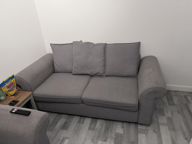 Preview of the first image of Two x grey DFS sofas for sale immaculate.
