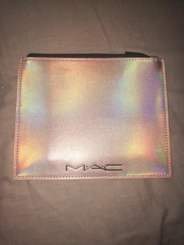 Preview of the first image of Mac Iridescent Pink Envelope Bag.