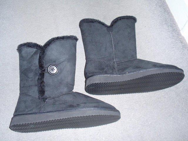 Preview of the first image of Brand New Black Furry Lined Boots.