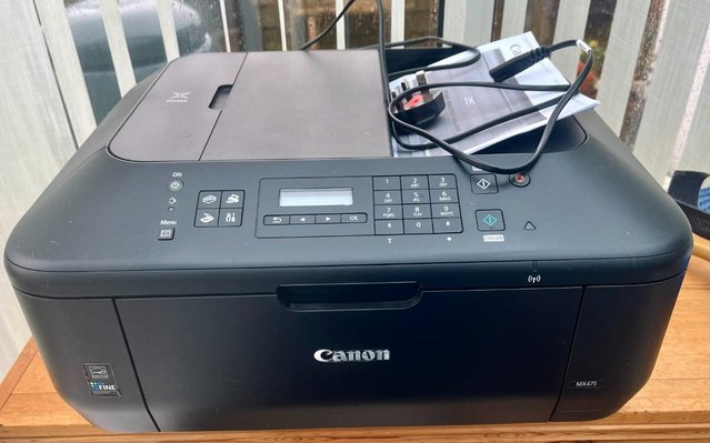 Preview of the first image of Canon Pixma MX475 printer / scanner.