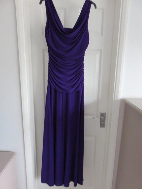 Preview of the first image of Deep purple full length dress in size 14.