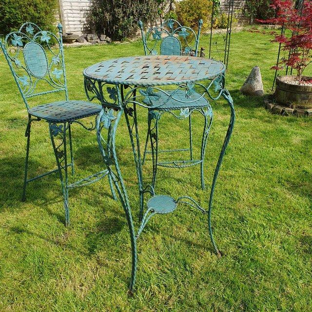 Preview of the first image of Stunning vintage wrought iron garden furniture.