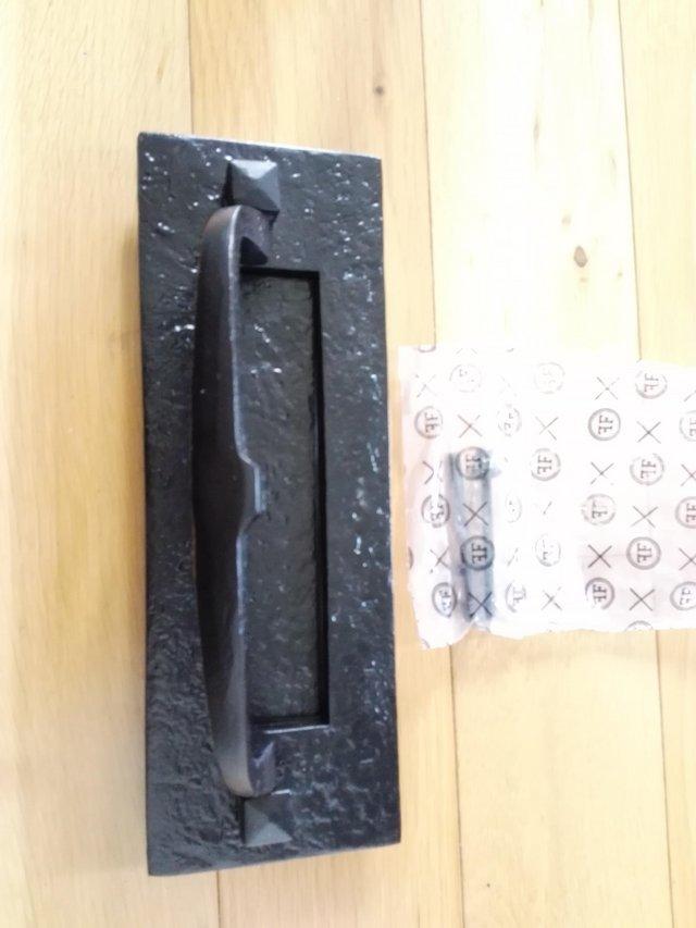 Preview of the first image of Black metal letterbox, new with fixings.