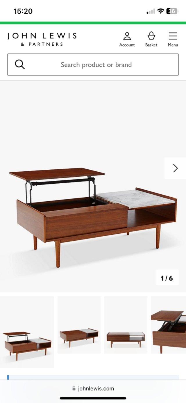 Preview of the first image of West Elm Mid-Century pop up coffee table.