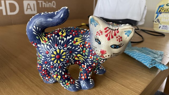 Preview of the first image of Unusual navy blue cat ornament - like new.