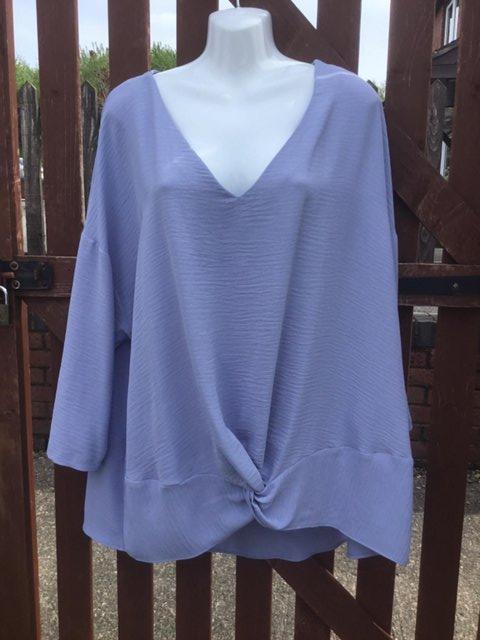 Preview of the first image of 2 ladies new tops size 18 1 cream & 1 Lilac.