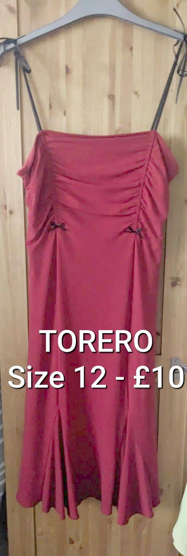 Preview of the first image of TORERO red dress for sale - size 12.