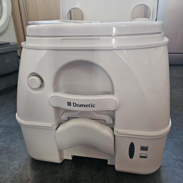 Preview of the first image of Dometic 972 portable toilet for sale.