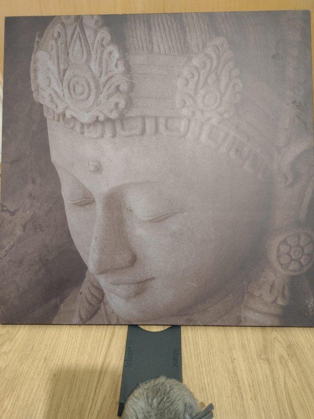Preview of the first image of Buddah calming wall picture on wood.