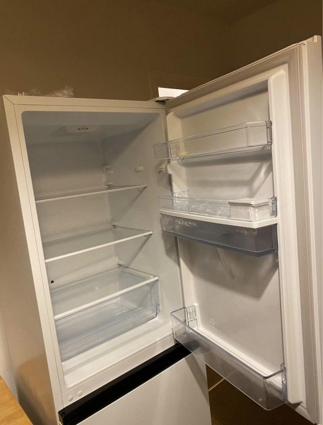 Preview of the first image of Fridgemaster, fridge and freezer with water dispenser.