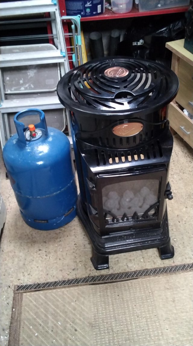 Preview of the first image of Province calor gas heater and cylinder.