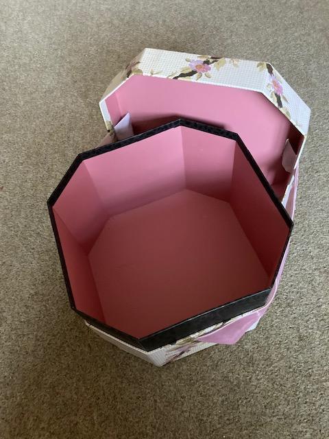 Preview of the first image of Beautiful floral hat box with pink ribbon tie.