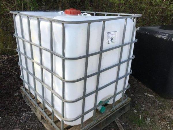 Image 1 of IBC CRATE with 1000 ltr water storage container.