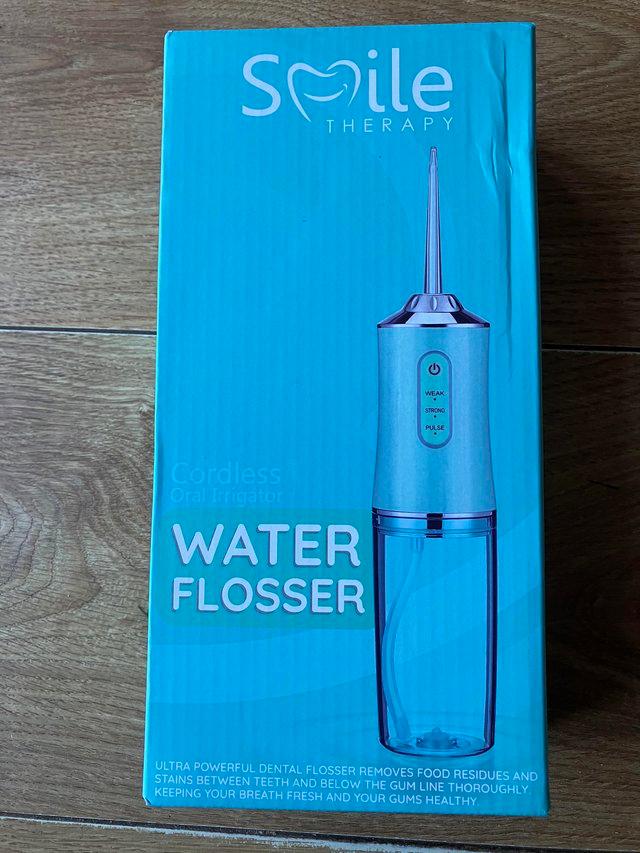 Preview of the first image of Water Flosser - Brand New In Box  REDUCED.