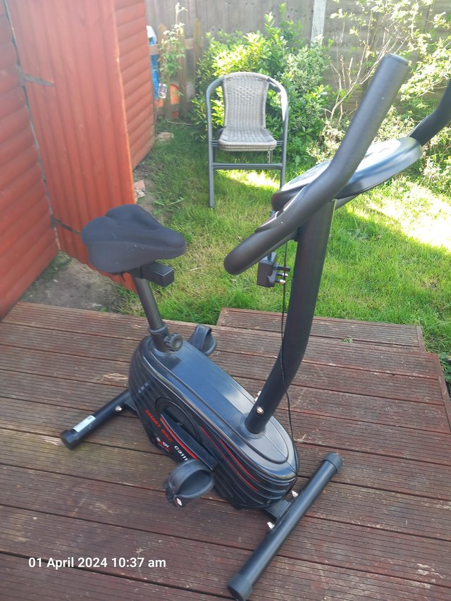 Preview of the first image of exercise bike with mains plug.