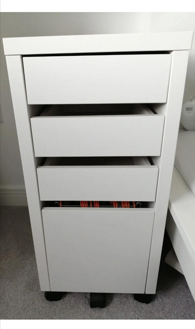 Preview of the first image of Ikea Micke White Drop Filing Desk 4 Drawers with Castors.