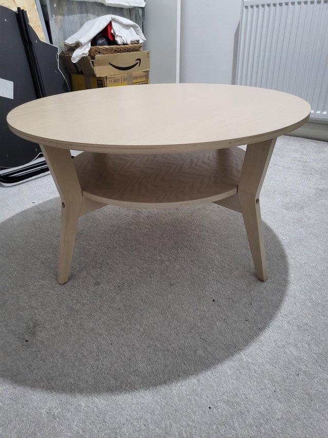 Preview of the first image of Ikea round oak coffee table.
