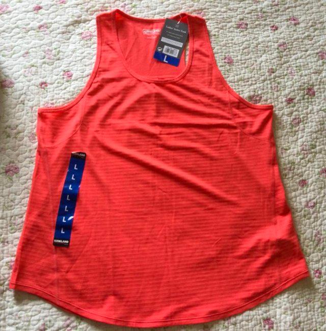 Preview of the first image of Sz L (41-44”) Bright Orange BNWT KIRKLAND Sports Vest Tank.