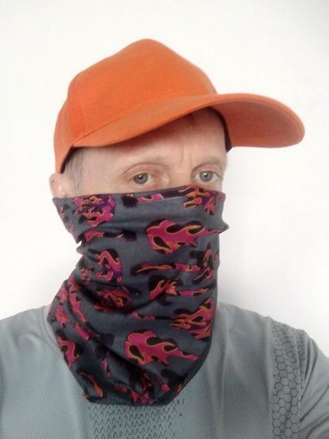 Orange baseball cap with a flame pattern thermal mask. - £18 each