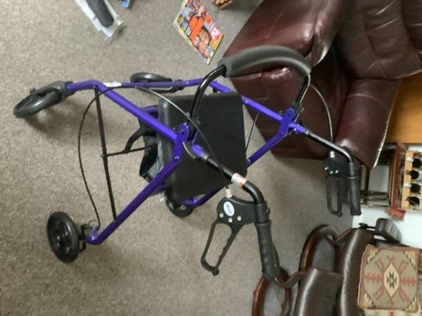 Image 2 of Unused brand new rollator blue.Very good 4 wheeler with seat