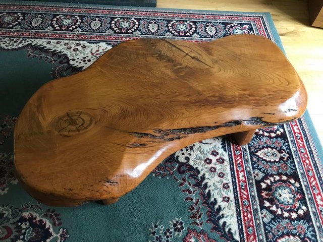 Preview of the first image of Solid wood coffee table elm? Very heavy.