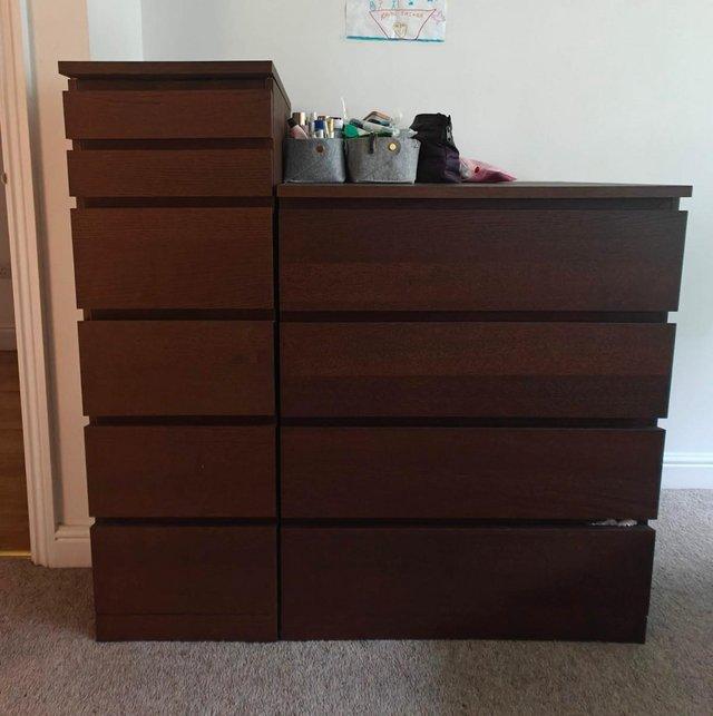 Preview of the first image of Two IKEA MALM chest of drawers in dark brown.